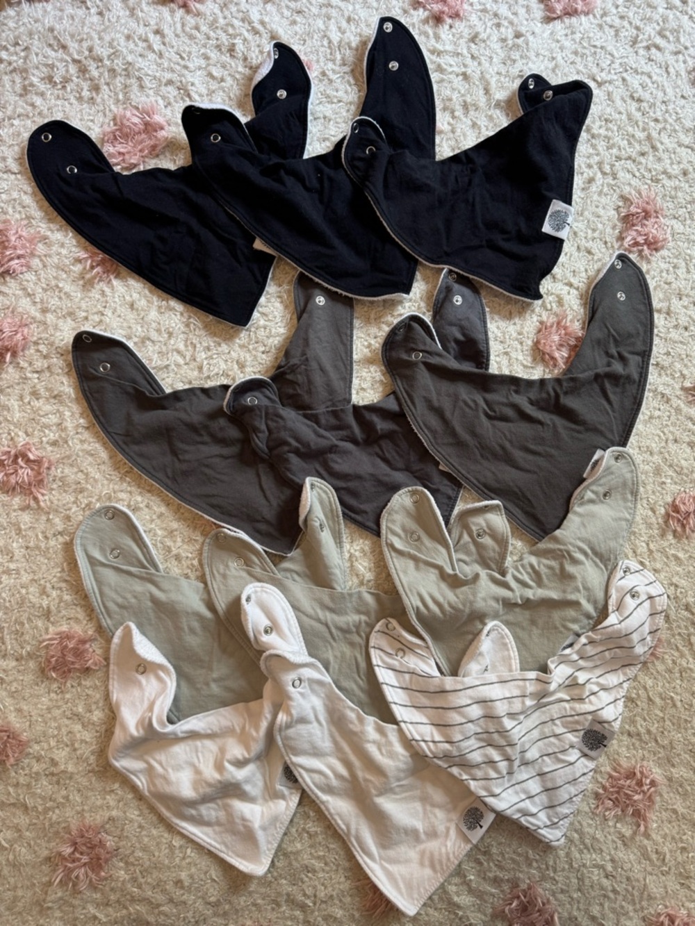 Pack of 12 solid color Parker Baby bibs